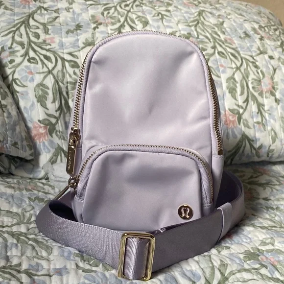Lululemon Small 2L Sling Bag💙💜 - Picture 10 of 13